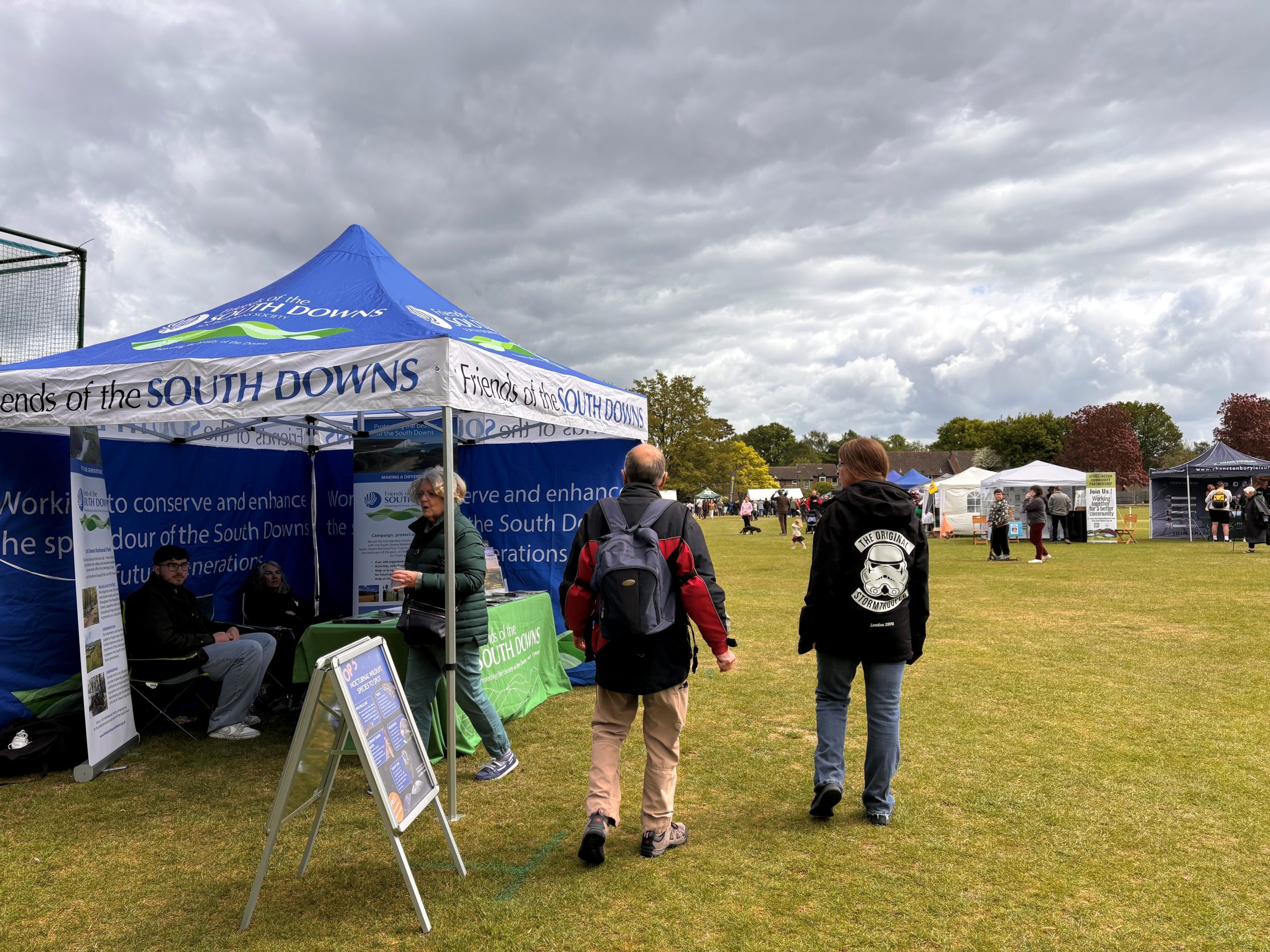 A landscape view of the White Stork & Nature Revival festival in Storrington and the stalls at this festival. 